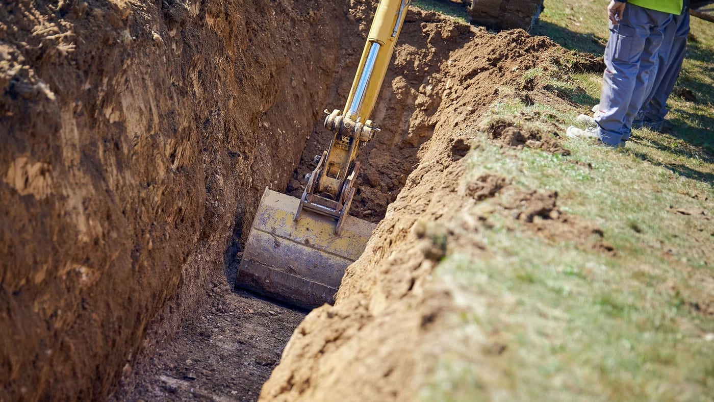 Excavation work preparing a building pad